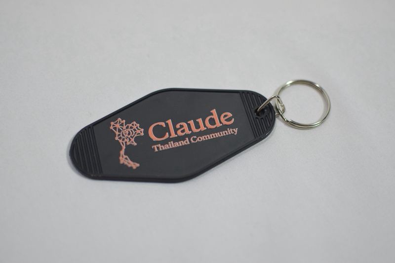พวงกุญแจ Claude Thailand Community สีดำ ลายโลโก้สีส้ม ของรางวัลในกิจกรรม